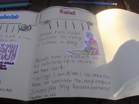 Page 2 on Salat illustrated with a coloured drawing of a boy performing the prayer.
